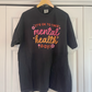 a black t - shirt that says it's ok to take mental health days