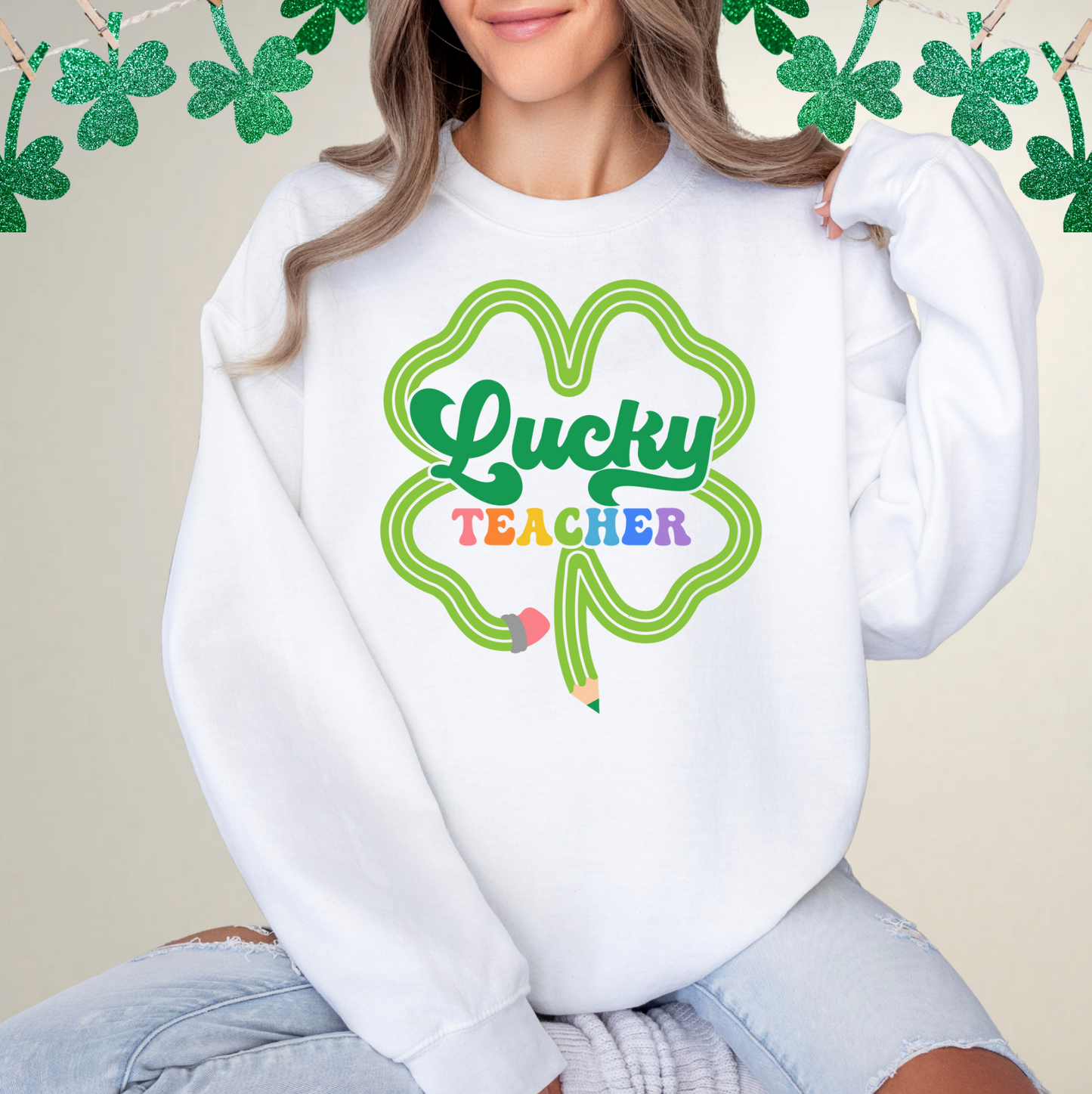 a woman wearing a white sweatshirt with a shamrock on it