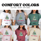 a group of women wearing matching shirts with christmas trees on them