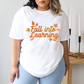 a woman wearing a white shirt that says fall into learning