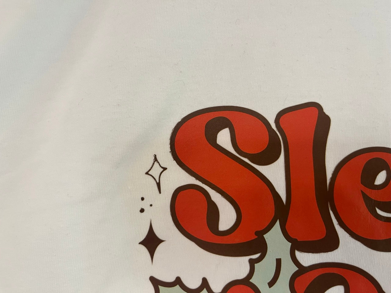 a close up of a t - shirt with the word sloe on it