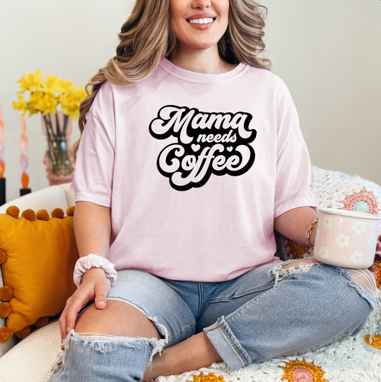 a woman sitting on a couch with a cup of coffee