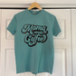 a t - shirt that says mama needs coffee hanging on a door